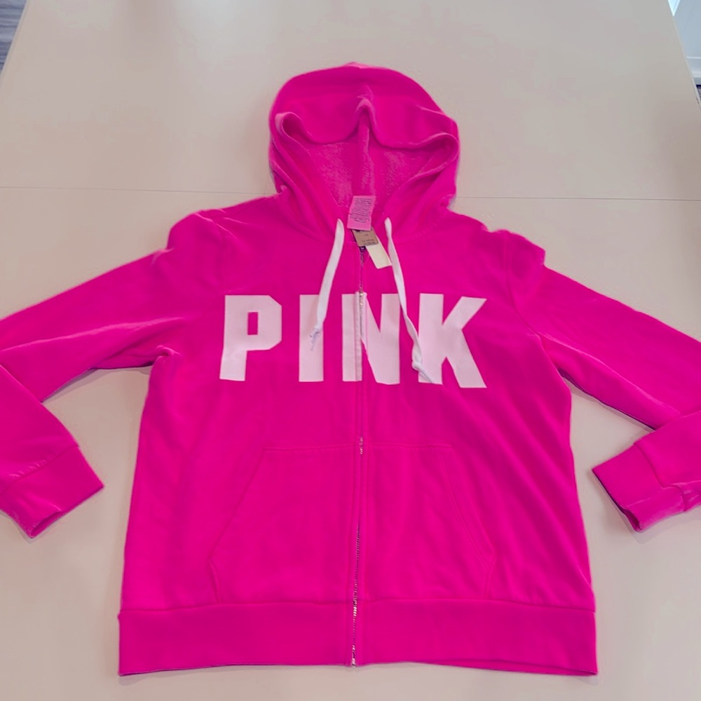 PINK zip hoodie. Size Large. New with tags 60% cotton 40% polyester. Neon pink